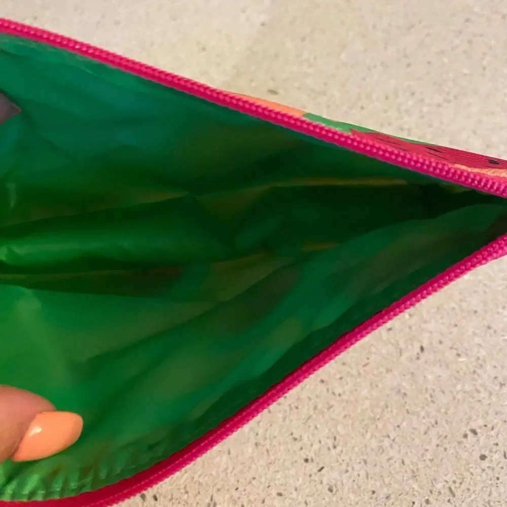 3 Women’s Clinique make up pouches
